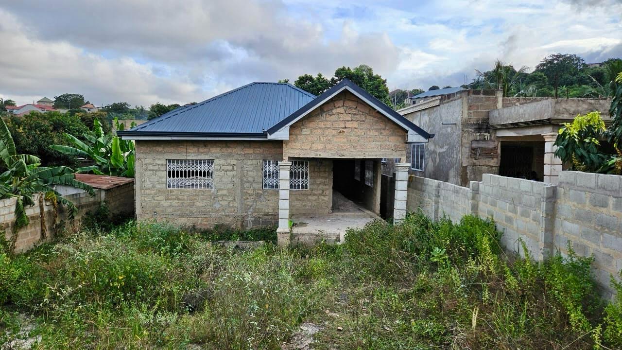 Prime Earth Realty leadership team standing on a property site